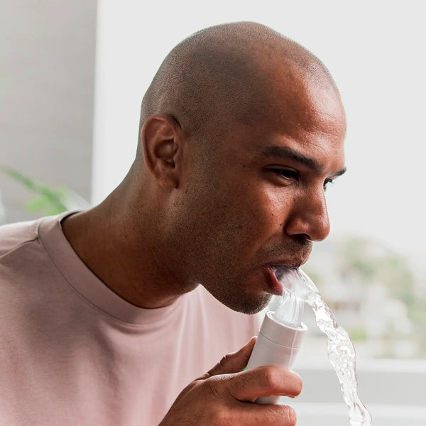 A man using his new proclai oral health system